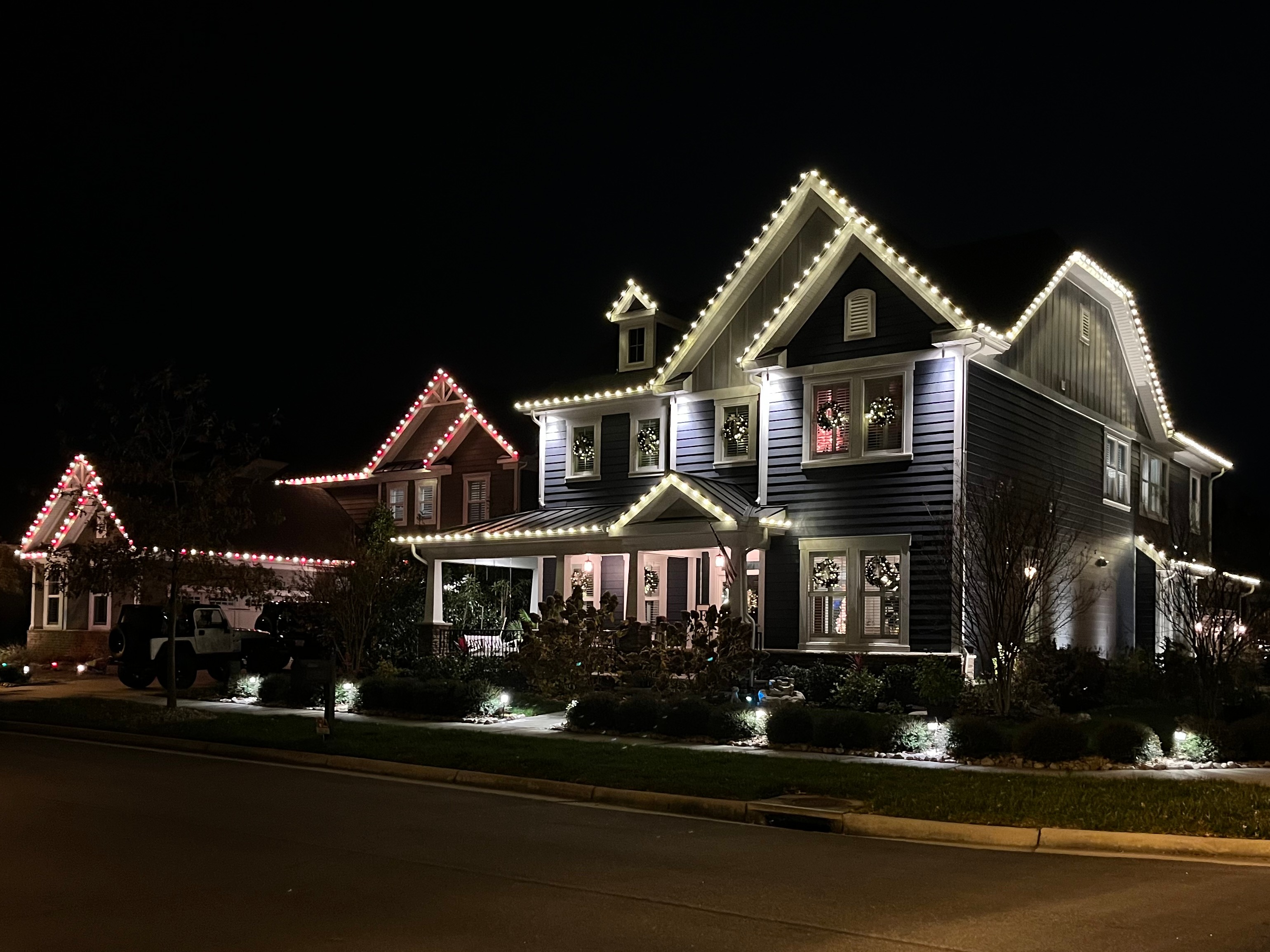 House decorated with Christmas lights at night