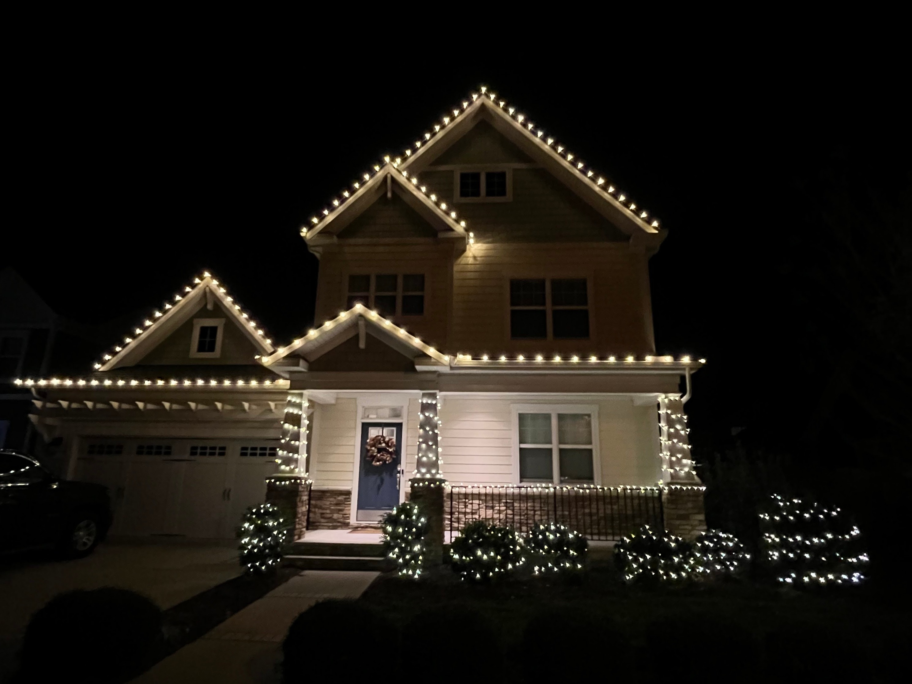 House decorated with Christmas lights at night Hampton Roads